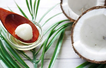 coconut and coconut oil on spoon